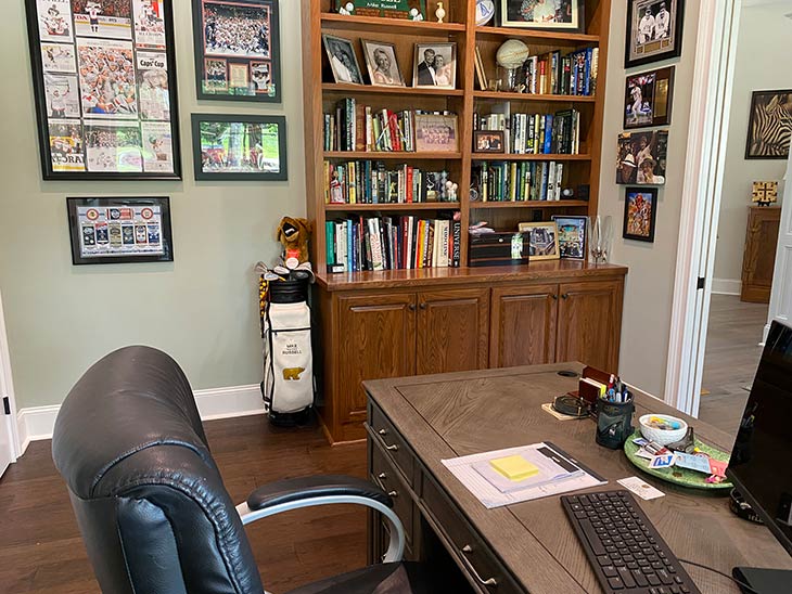Photo of home office with bookshelves