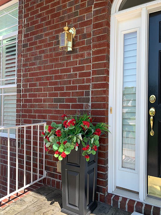 Photo of flowers in front of residence in Firefly Meadow